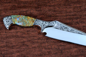 "Malaka" fine custom handmade knife reverse side engraving detail  in hand-engraved CPM 154CM powder metal technology stainless steel, T4 deep cryogenically treated, bolsters of hand-engraved 304 stainless steel, Plasma agate and Nephrite Jade gemstone handle, hand-carved leather crossdraw sheath with stainless steel hardware