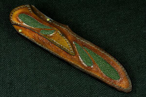 "Opere" Custom Knife, sheath back and belt loop view in T4 cryogenically treated CPM 154CM powder metal stainless steel blade, 304 stainless steel bolsters, Nephrite Jade gemstone handle, hand-carved leather sheath inlaid with green rayskin